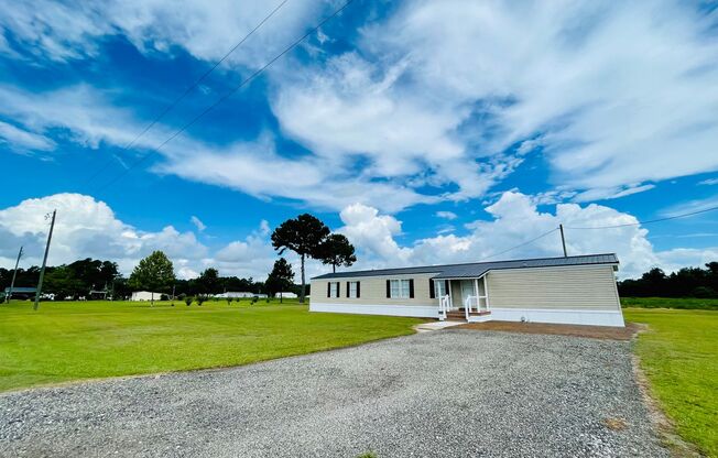 Move in ready!! Privacy and views galore with this 3BD/2BA mobile home in Aynor School District!!