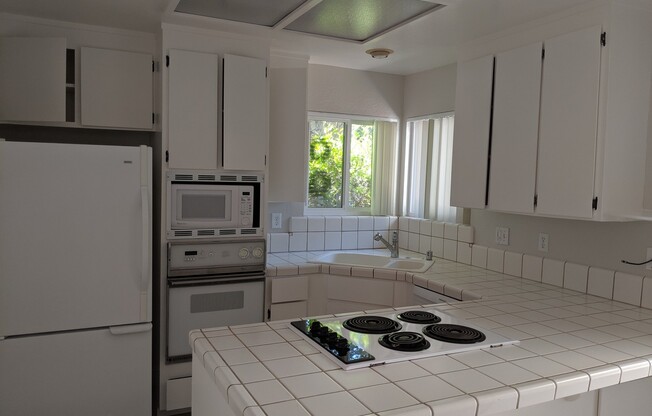 Beautiful Ground Level Front Unit with 2 Car Garage