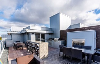 Fireplace and lounge seating on Rooftop Terrace