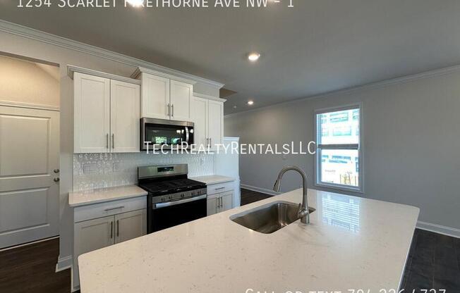 1254 SCARLET FIRETHORNE AVE NW
