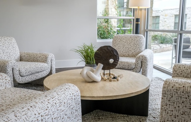 social lounge with conversation areas at The Allure apartments