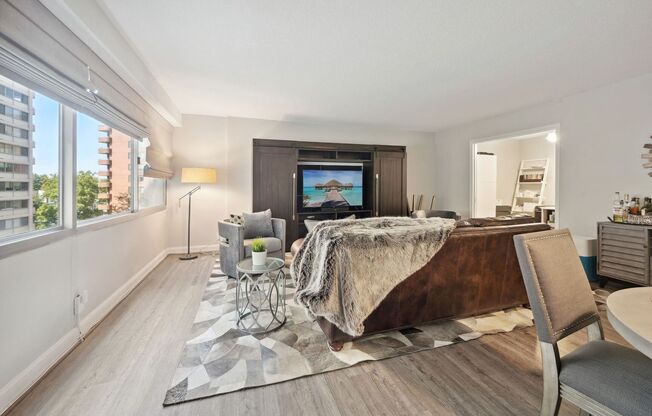 Updated 1,000 Square Foot One Bedroom W/Parking Included- Roof Top, Pool, Front Desk, AMAZING LOCATION!