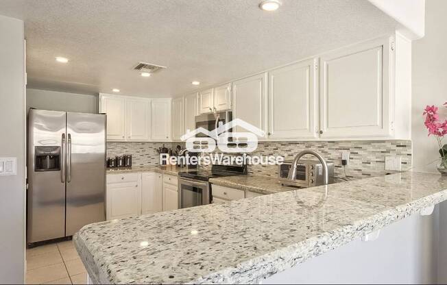 11217 E LAUREL LN