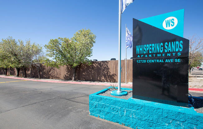 Monument Sign at Whispering Sands Apartments in Albuquerque