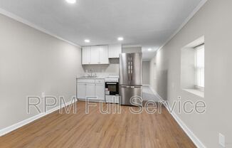 325 54 AVE N
