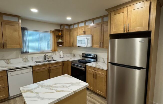 Beautifully Renovated 2 Bedroom Condo - Partially Furnished