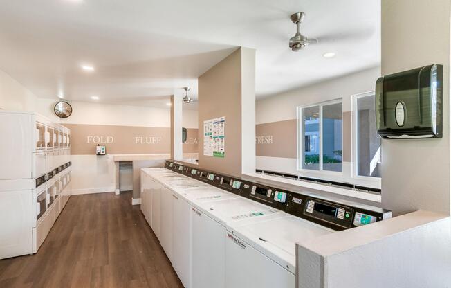 a kitchen with a sink and a mirror