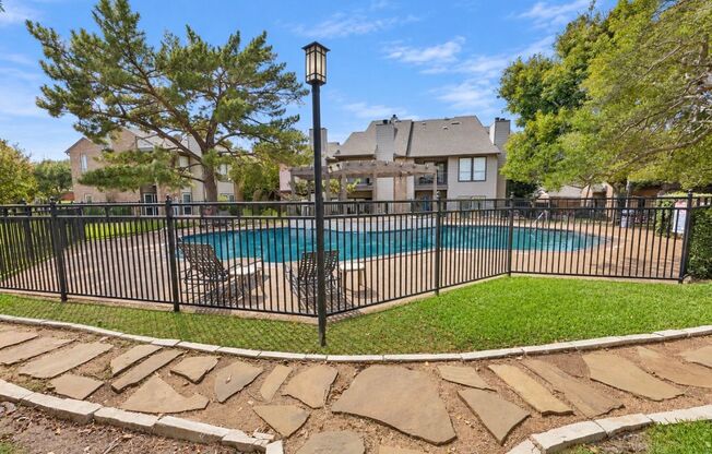 This is the place to be! Beautifully Updated 2-Bed Condo in the Heart of Addison
