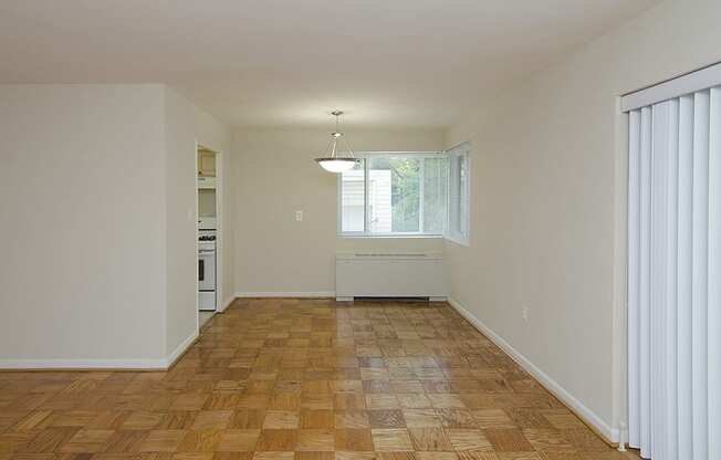 One-bedroom living and dining at Legation House in Washington, DC 20015