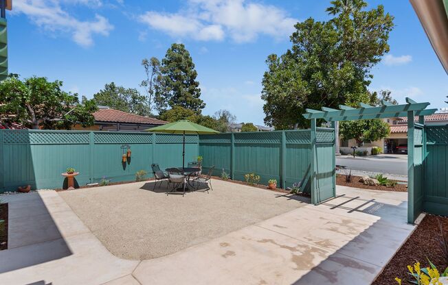 Charmingly remodeled three bedroom two and a half bath Spanish duplex in serene Hidden Valley!