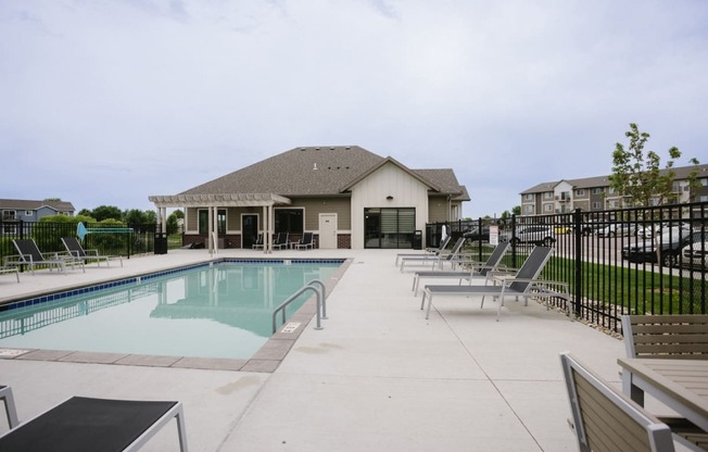 the swimming pool at the falls at rolland park apartments fl