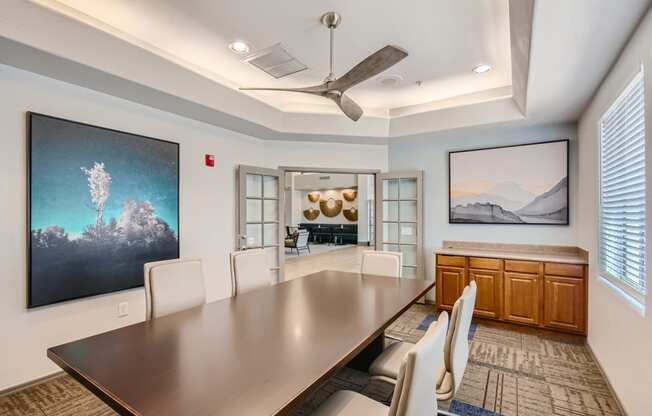 the preserve at ballantyne commons conference room with a table and chairs and a