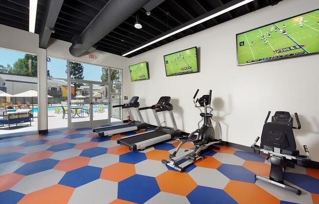 Fitness center with cardio equipment at Horizon Apartments in Santa Ana, California