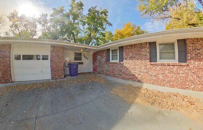 3D Tour Available-Spacious Home Near Bill Synder Stadium! Fenced-in Yard + Attached Garage + Washer & Dryer! Available August 1st!