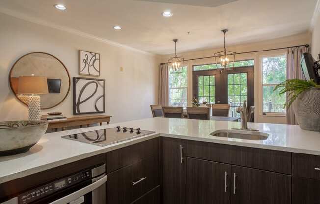 a kitchen with a sink and a counter top