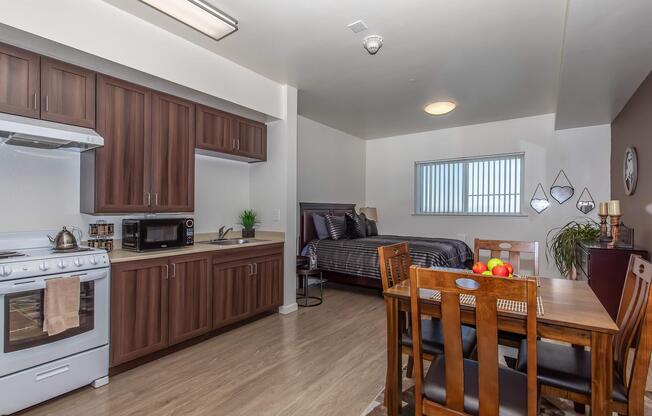 a kitchen with a dining room table