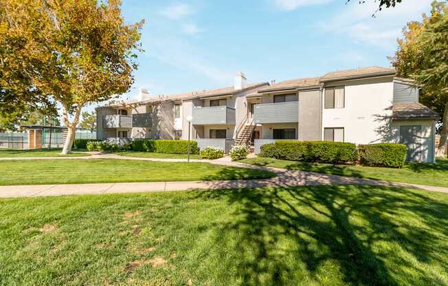 A sunny day at a well-kept apartment complex.