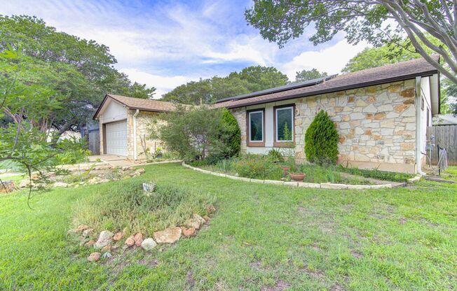 Freshly Updated 4 Bed Home with Solar Panels & Incredible Native Landscaping