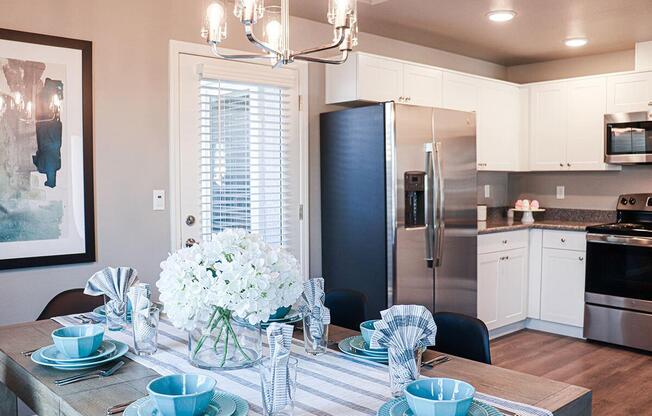 a kitchen with a dining table