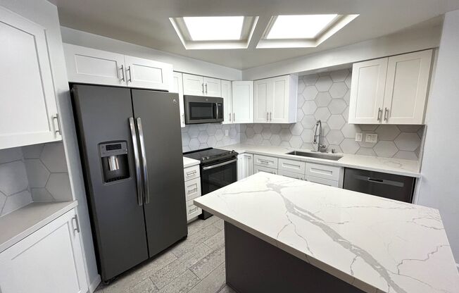 $500 OFF First Month's Rent! 2BR/2BA Downtown Marina District Condo - Gated Community, In-Unit Laundry, Assigned Parking, and Pet Friendly!