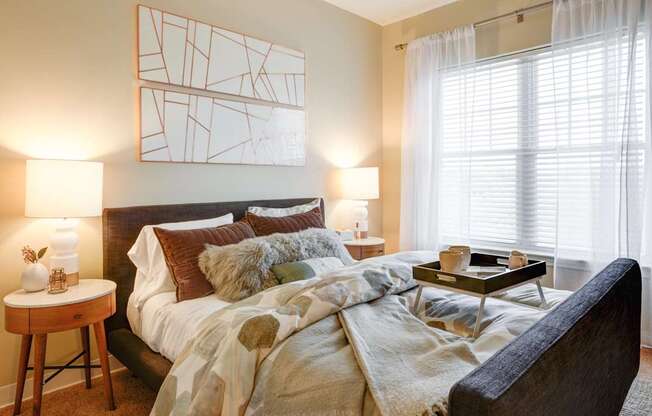 Bedroom with Double Bed and Oversized Windows at Canton Woods Apartments in MA