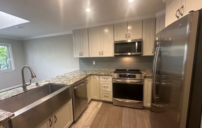 3 Bed/2 Bath- Beautifully Updated Townhome w/ Backyard- Move In Ready! Yes!