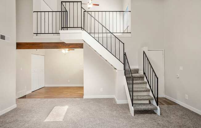 A living room with loft at Hilltop View Apartments