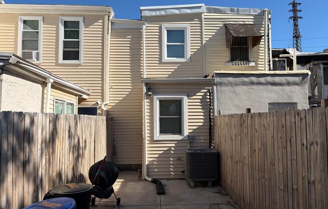 Modern 2- Story Townhome with Fenced in Back Yard