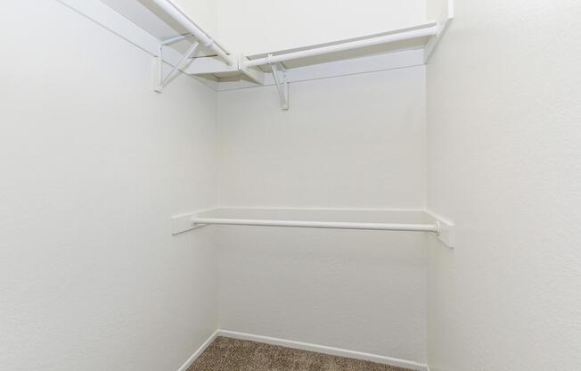 a white tub sitting next to a shower