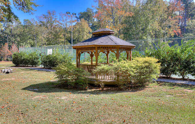 a gazebo in the middle of a park