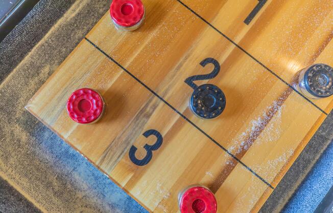 a guitar on a wooden table