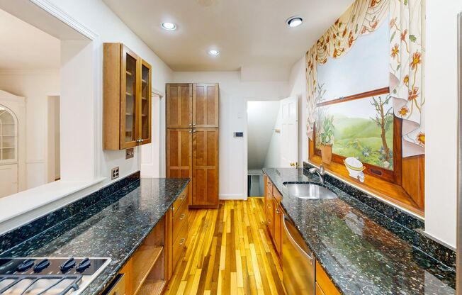 NW DC locale...3 level - 2 bed + Den with 2.5 & off street parking  - 16 months only