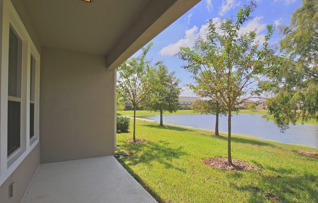 Modern 3/2.5 Spacious Townhome with Gorgeous Lake Views and 1 Car Garage in Thornbrooke - Sanford!