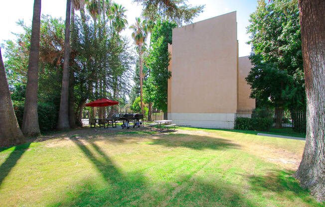 Large private park area surrounding the barbecue space.