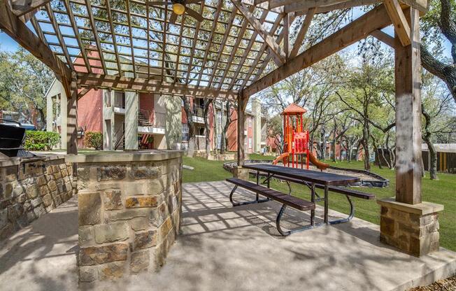 Pergola Picnic Area With Grilling Facility at Wildwood Apartments, CLEAR Property Management, Austin, Texas