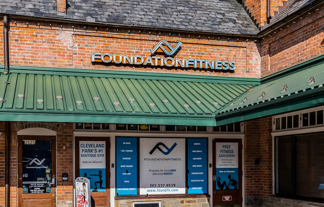 the front of a building with a sign that reads foundation fitness