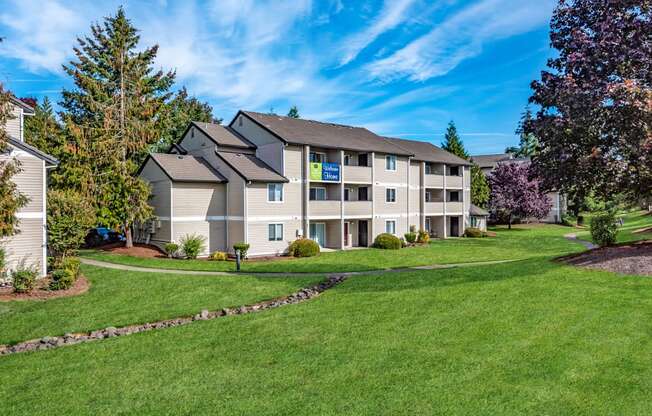 Sir Charles Court three story building exterior and green space, Beaverton, OR, 97006