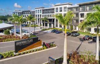 a building with a parking lot in front of it