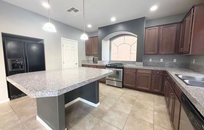 Spacious 5-Bed, 2.5-Bath Las Vegas Home with Granite Kitchen & Garage