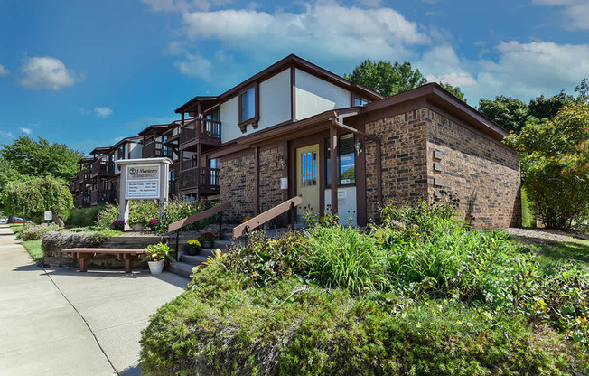 A leasing office with a welcome sign at Old Monterey Apartments, Springfield, MO