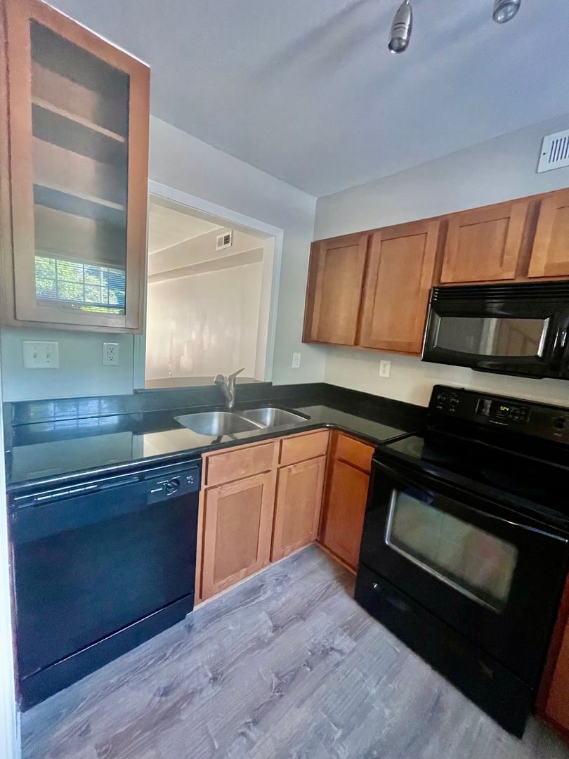 Must see this adorable 2 bedroom 1.5 bath townhouse located off Commonwealth Ave