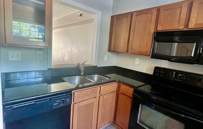 Must see this adorable 2 bedroom 1.5 bath townhouse located off Commonwealth Ave