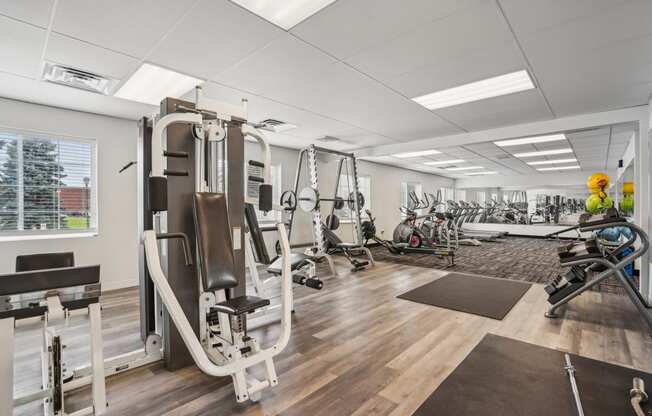 Townhomes In Burnsville, MN for Rent – Summit Townhomes - the gym is equipped with weights and other exercise equipment
