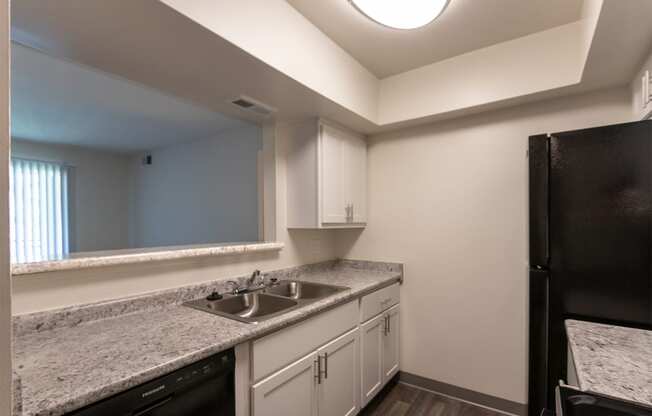 This is a photo of the kitchen in the 841 square foot, 2 bedroom, 1 bath with upgrade  floor plan at Village East Apartments in Franklin, OH.