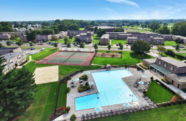 Aerial view of Franklin Commons apartments for rent with swimming pool and tennis courts in Bensalem, PA
