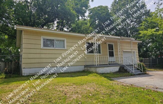 Don't Miss this Charming 2 bedroom with Garage, Large Yard and Storage