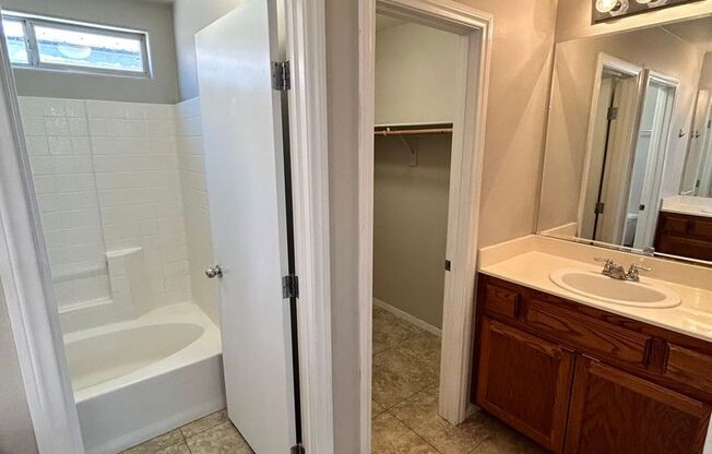 Charming 3 Bed/3Bath, 2-Story Home nestled in this beautiful Henderson Community close to the Galleria Mall and Cowabunga Bay Water Park!