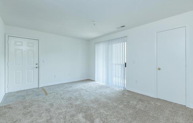 a bedroom with a bed in a room