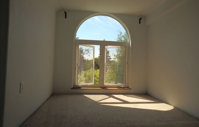 Spacious upper 3-bedroom unit with 2 full bathrooms in an attractive duplex.