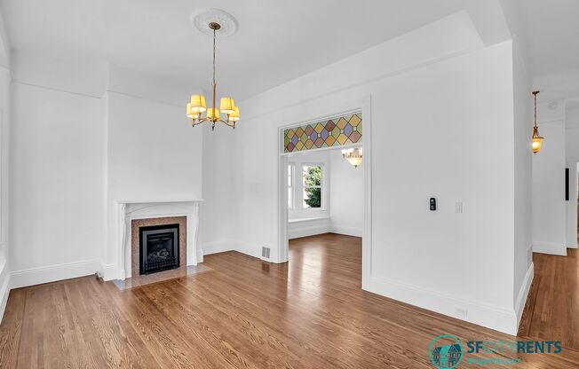 Mission: Bright Corner Condo with Garage Parking & W/D in-unit